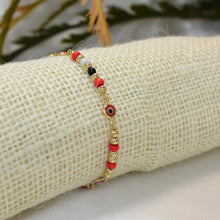 14k gold plated bracelet featuring evil eye beads, designed as a protection pulsera.