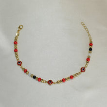 14k gold plated bracelet featuring evil eye beads, designed as a protection pulsera.