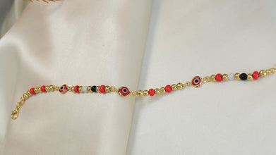 14k gold plated bracelet featuring evil eye beads, designed as a protection pulsera.